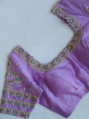 Stunning meenakari kanjeevaram in pastel green and lavender hues
