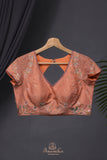 Crushed tissue saree in peach with beautiful cutwork border