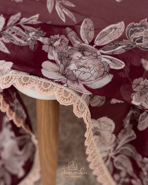Brown Floral Chinnon saree with a contrast beige handwork blouse