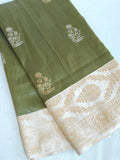 Banarasi tissue saree in a lovely sage green and ivory combo