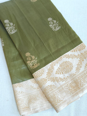 Banarasi tissue saree in a lovely sage green and ivory combo