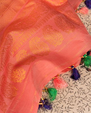 Peach Gadwal saree with peacock motifs