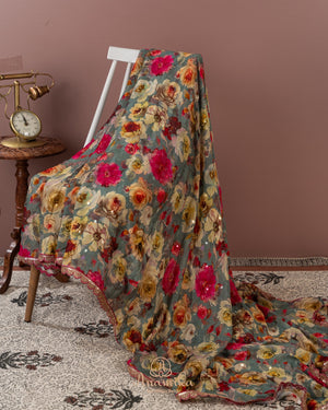 Grey Floral Chinnon saree with a contrast handwork blouse