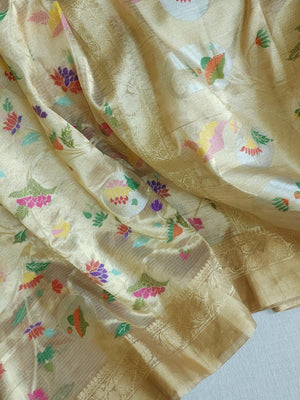 Banarasi Tissue saree in gold with all over floral motifs