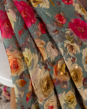 Grey Floral Chinnon saree with a contrast handwork blouse