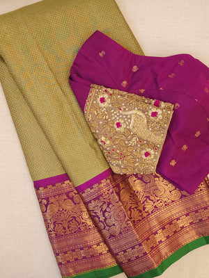 Royal Gadwal kanchiPattu saree in a beautiful parrot green and magenta combination