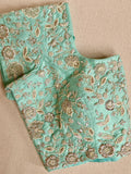 Light Blue kanjeevaram saree with a heavy embroidered blouse