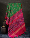 Pure Patola silk saree in a lovely shade of green and pink