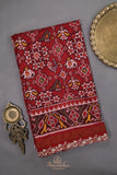 Patan Patola saree with intricately designed maggam work border