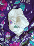 Tusser georgette saree in purple with all over floral weave and paired with pure paithani blouse