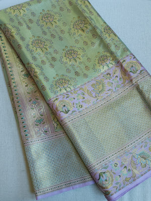 Stunning meenakari kanjeevaram in pastel green and lavender hues