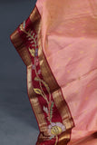 Peach and maroon kanjeevaram with floral applique border