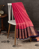 Kanchipattu saree in lovely rose pink shade with a contrast dark blue border