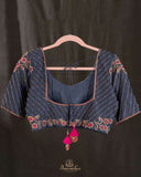 A dark navy blouse in pure silk with beautiful embroidery