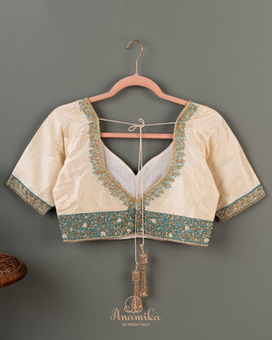 Pastel Blue banarasi silk saree with contrast off white work blouse