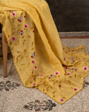 Lovely yellow tissue saree with beautiful thread embroidered border