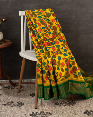 Yellow Gadwal saree with pen kalamkari print