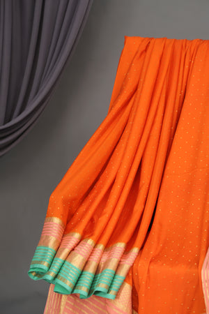 Pure mysore crepe silk saree in a beautiful shade of orange