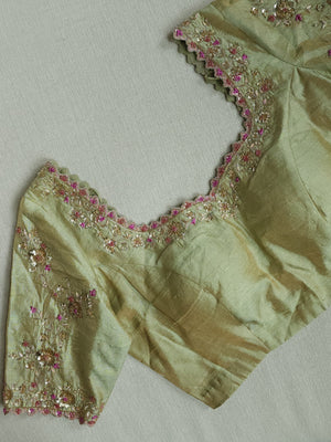 Very light pastel green tissue blouse with intricate embroidery