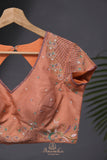 Crushed tissue saree in peach with beautiful cutwork border