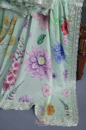 Mint Green Crepe Floral saree with hand worked border