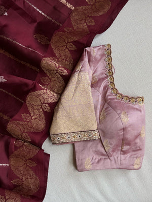 Raw  mango Pattu saree in maroon paired with a contrast mauve lilac blouse