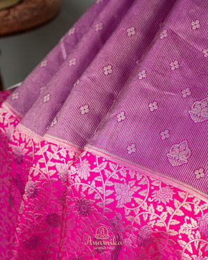 Unique kanjeevaram in lilac with a stunning floral pink border