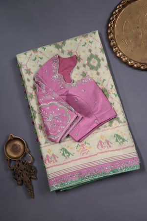 Pastel Patola with intricately designed handwork border