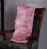 A beautiful rose pink tissue saree with an off white blouse