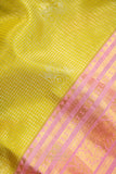 A dreamy kanjeevaram saree in a pastel lime shade