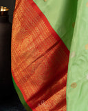 Gadwal Pattu saree in mint green and orange combo