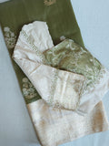 Banarasi tissue saree in a lovely sage green and ivory combo