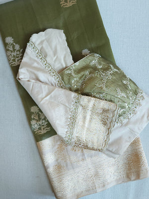 Banarasi tissue saree in a lovely sage green and ivory combo