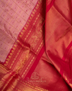 Light baby pink Kanchipattu saree with a contrast dark pink border