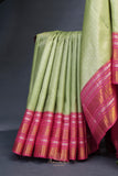 A dreamy kanjeevaram saree in a pastel green shade