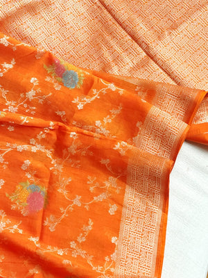 Deep Orange Munga silk saree with contrast off white puff sleeves blouse