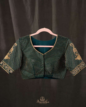 Dark Bottle Green blouse with all over cutdana work