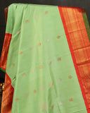 Gadwal Pattu saree in mint green and orange combo