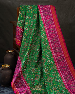 Pure Patola silk saree in a lovely shade of green and pink