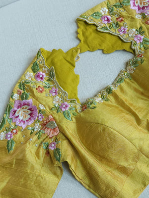 Sea Green Crush Tissue saree with a beautiful floral embroidered border