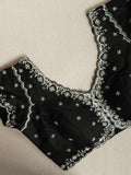 Falling organza saree in black with all over sequins work