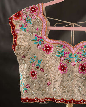 Beige blouse with delicate all over work