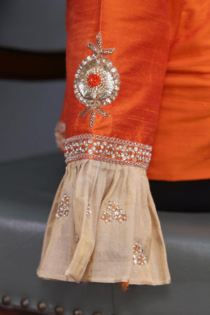 Banarasi brocade tissue saree in champagne with a beautiful light orange border