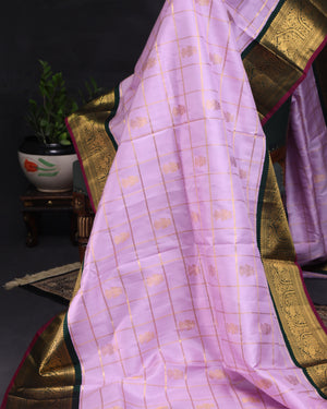 Gadwal kanchi saree in a beautiful lavender and emerald green combo