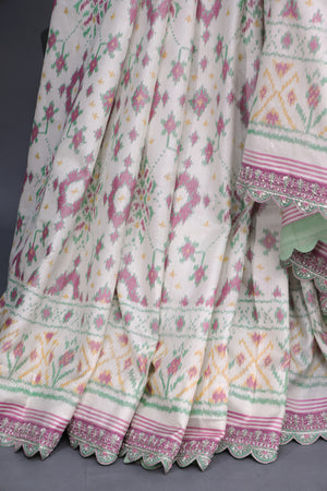 Pastel Patola with intricately designed handwork border