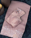 Brocade tissue georgette sarees with intricately embroidered border