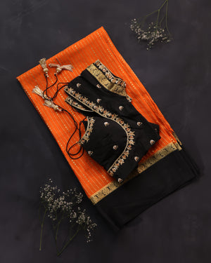 Orange mysore crepe silk saree with a stunning blouse pattern