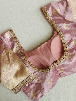 Raw  mango Pattu saree in maroon paired with a contrast mauve lilac blouse