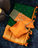 Kanchi soft silk saree in an evergreen green and light orange combo