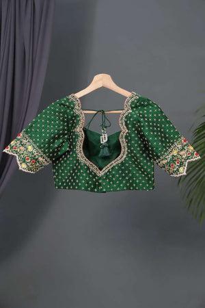 Dark green blouse with heavy embroidery work